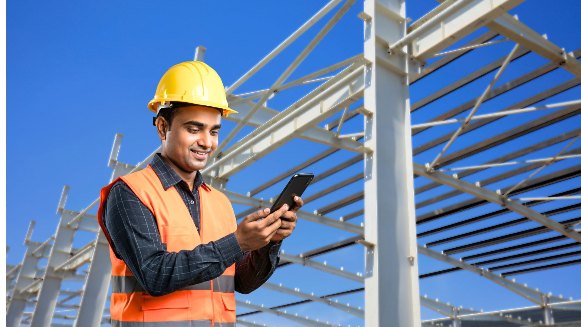 Integrated Quality Management construction project software with Indian construction worker looking at mobile app